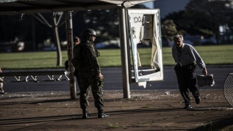 Brazil’s embattled president cancels order for troops in capital amid riots, claims of power grab