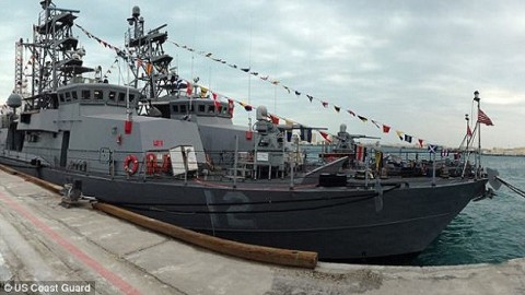 The moment a US Navy patrol boat fires warning shots at an Iranian naval ship as it comes within 150 yards in the Persian Gulf