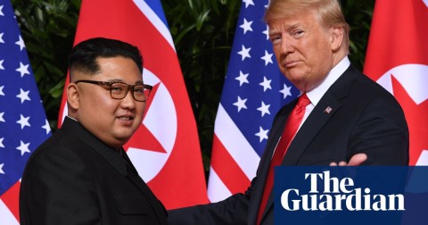 Donald Trump gestures as he meets Kim Jong-un in Singapore in June. Photograph: Saul Loeb/AFP/Getty Images