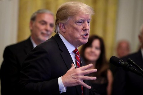 Current US president Donald Trump in a meeting with the Democratic party at the Oval Office.