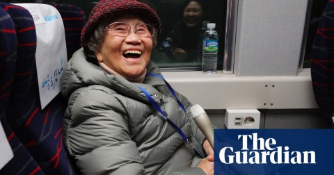 Kim Geum-ok, who was separated from her family during the Korean War, boards a train to the ceremony in the border town of Kaesong. Photo: Yonhap/EPA