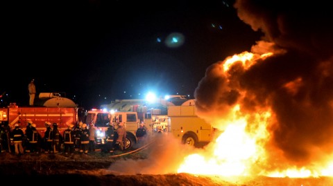 Firefighters work to extinguish a massive blaze triggered by a leaking pipeline in Tlahuelilpan, Mexico on Friday night. At least 66 people were killed. Photo: Francisco Villeda/AFP/Getty Images