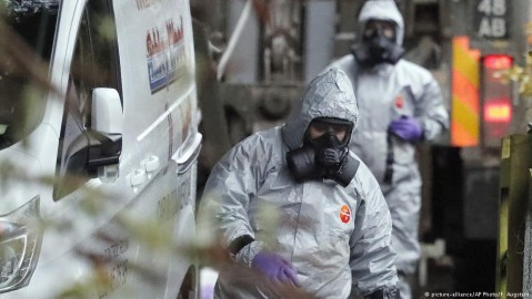 Security personnel in protective gear following the Novichok incident. Photo: F. Augstein / AP