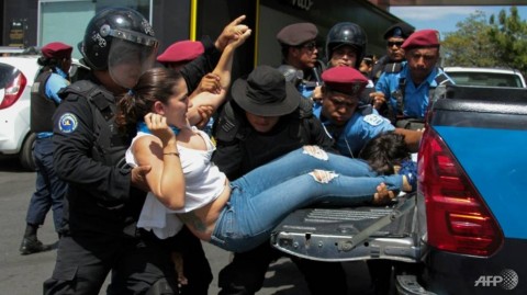 Riot police square off with anti-government demonstrators in Nicaragua, now on a new human rights black list.