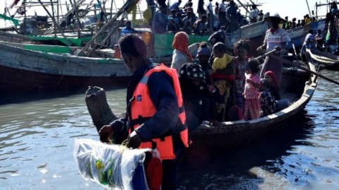 Myanmar Navy personnel escort Rohingya Muslims back to their camp in Sittwe, Rakhine state, on Nov 30, 2018.