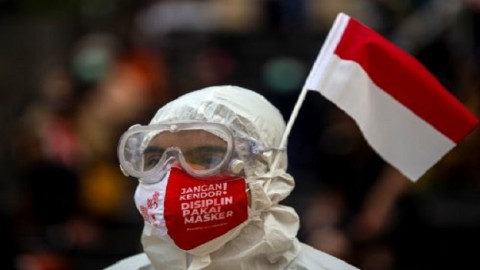 2021-08-17T080841Z_1008826718_RC2V6P9YSCJM_RTRMADP_3_HEALTH-CORONAVIRUS-INDONESIA-INDEPENDENCEDAY-500x333