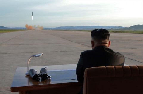  North Korean leader Kim Jong-Un inspects a launching drill of the medium- and long-range strategic ballistic rocket Hwasong-12 at an undisclosed location last month. AFP/Getty