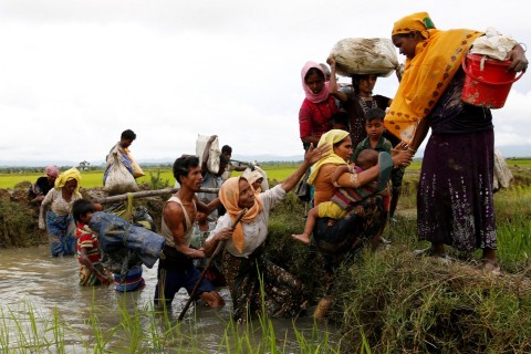 May vows to tackle 'inhuman destruction of the Rohingya people'