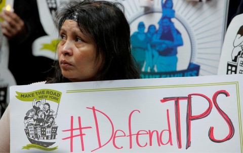 Salvadoran immigrant Mirna Portillo watches during a press conference following President Trump’s announcement ending Temporary Protected Status for Salvadoran immigrants on January 8, 2018. (Reuters / Andrew Kelly)