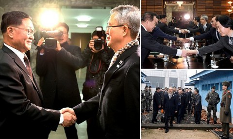 The head of South Korean delegation Lee Woo-sung, right, and the head of North Korean delegation Kwon Hook Bong, left, arrive for their meeting at the North side of Panmunjom in North Korea on Monday. Photo: AP