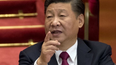 Chinese President Xi Jinping gestures during the closing ceremony for the 19th Party Congress held at the Great Hall of the People in Beijing, Oct. 24, 2017.