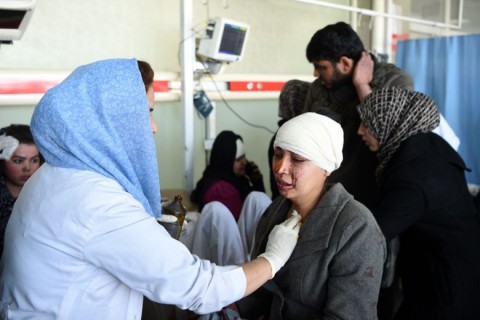 Afghan medical staff treat a woman wounded by a car bomb near the old Interior Ministry building, at Jamhuriat Hospital in Kabul, January 27, 2018. Photo: Wakil Kohsar/Getty Images