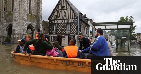 A rescue boat in a flooded street of Nemours, near Paris, France, after downpours in June 2016. Photograph: Kenzo Tribouillard/AFP/Getty Images