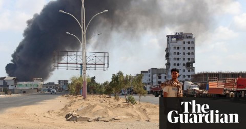 Smoke from one of the explosions rises in Aden, the Yemeni government’s de facto capital. Photo: Saleh al-Obeidi/AFP/Getty Images