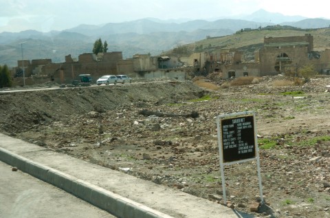 A vacant lot, leveled during the two-year Pakistani offensive against the Haqqani network lies dormant in the North Waziristan city of Miran Shah. Small placards indicate the property's ownership claims, should they return to the provincial capital. Photo: Carlo Muñoz/The Washington Times