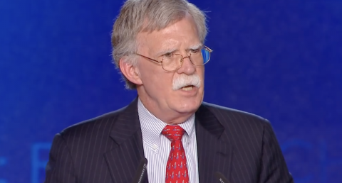 John Bolton addressing the terrorism-linked group MEK at a conference. Image: Screenshot