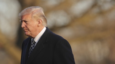 The White House announced Monday that it was expelling dozens of Russian officials from the US. President Trump is seen walking across the South Lawn of the White House Sunday. Photo: Pablo Martinez Monsivais/AP