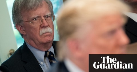 John Bolton listens as Donald Trump conducts a cabinet meeting at the White House. Photo: Saul Loeb/AFP/Getty Images