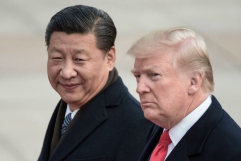 Chinese President Xi Jinping and Donald Trump in Beijing on Nov. 9. Photo: Fred Dufour/AFP/Getty Images