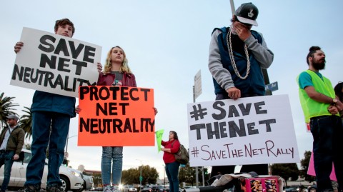 Senate Democrats say they have the votes to formally disapprove of the FCC's Internet policy that will take effect next month. Here, supporters of net neutrality protest the decision to repeal the Obama-era rule. Photo: Kyle Grillot/Reuters