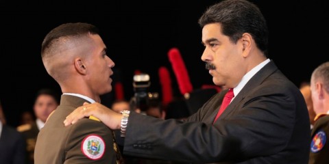 Venezuelan President Nicolas Maduro with Defense Minister Vladimir Padrino Lopez at a military parade in Caracas, June 24, 2016. Photo: Reuters/Marco Bello