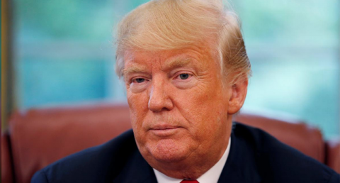 US President Donald Trump listens to a question during a Reuters interview in the White House Oval Office, August 20, 2018. Photo: Leah Millis / Reuters