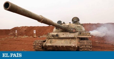 Syrian rebel moving a tank away from the Idlib area