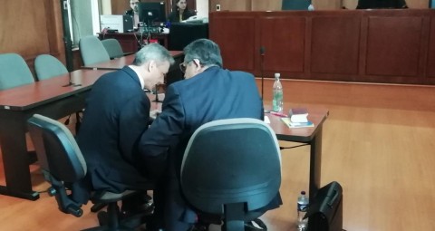 Colombian Magistrate Eduardo Castellanos (left) during trial in Bogota court