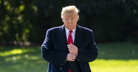 President Donald Trump prepares to speak to the media as he departs the White House earlier this month. Photo: Jim Lo Scalzo / EPA